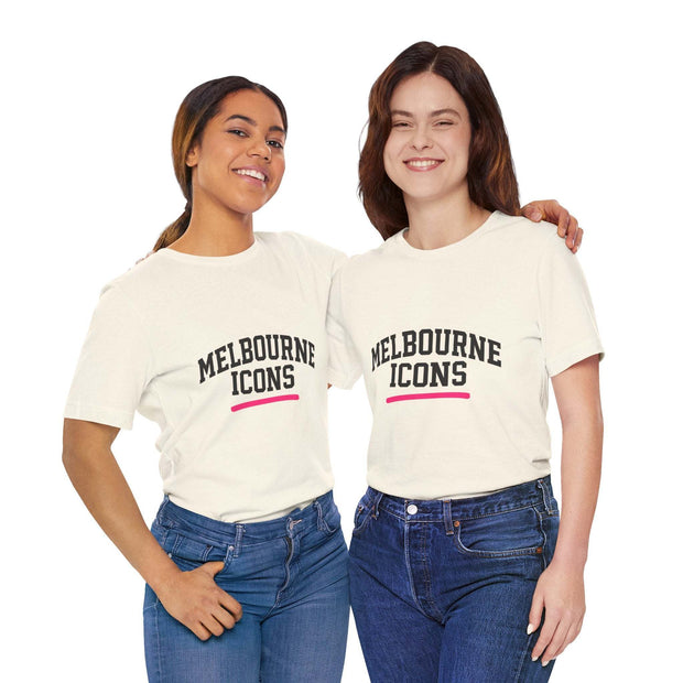 Two women wearing white unisex jersey short sleeve tees with "Melbourne Icons" text, styled with jeans