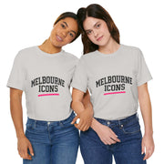 Two women wearing white unisex jersey short sleeve tees with "Melbourne Icons" text, styled with jeans.