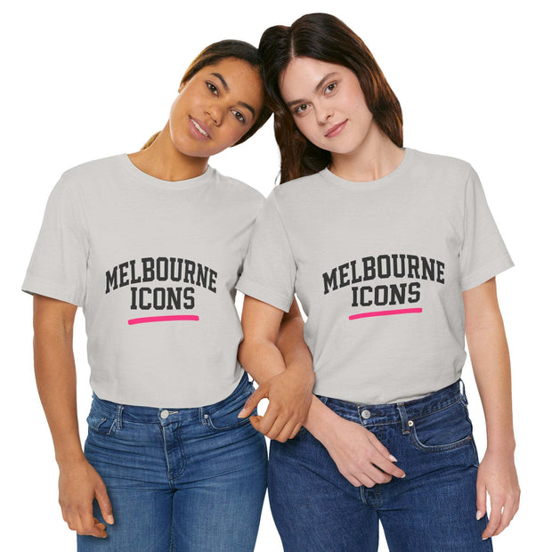 Two women wearing white unisex jersey short sleeve tees with "Melbourne Icons" text, styled with jeans.